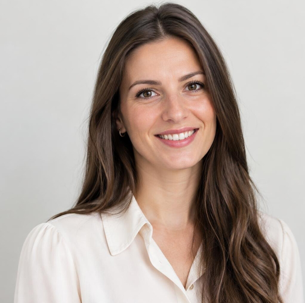 Portrait of a smiling Croatian woman with long brown hair
