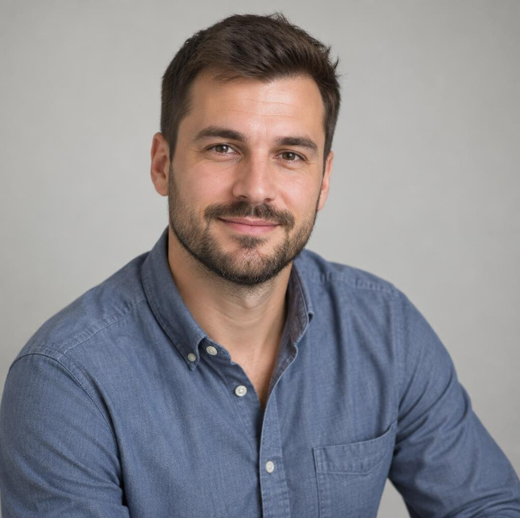 Portrait of a bearded Croatian man in a casual shirt